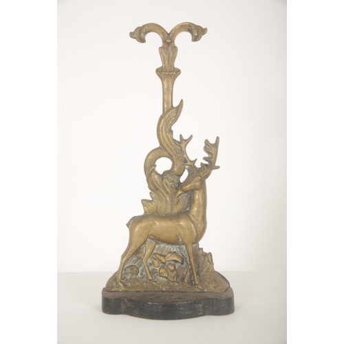 192 - A VICTORIAN BRASS STAG DOOR STOP

late 19th century, stood on iron foliated base, 40cm high x 19cm l... 