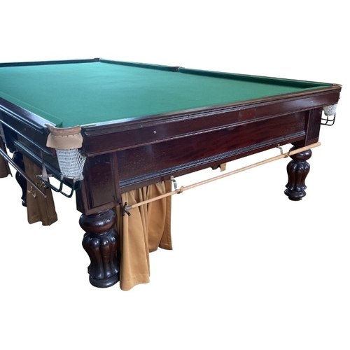 208 - A VICTORIAN MAHOGANY BILLIARDS TABLE

the green baize lined playing surface on eight turned and reed... 