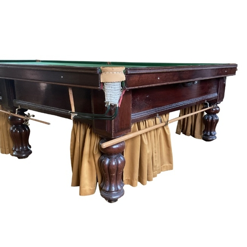 208 - A VICTORIAN MAHOGANY BILLIARDS TABLE

the green baize lined playing surface on eight turned and reed... 