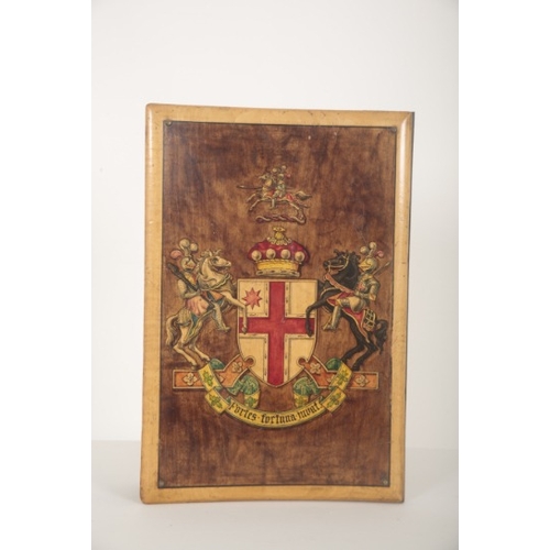 214 - TWO WOODEN FOLIO COVERS WITH PAINTED ARMORIAL CRESTS

probably mid to late 20th century, 35cm x 24cm... 