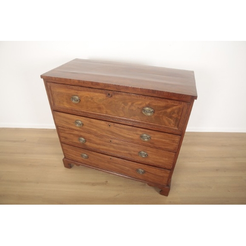 218 - A GEORGE III MAHOGANY SECRETAIRE CHEST

mid-19th century, the front fall enclosing pigeonholes and e... 