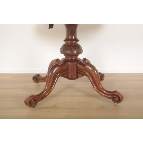 219 - A VICTORIAN BURR WALNUT OVAL OCCASIONAL TABLE

late 19th century, scalloped edge, heavily carved cen... 