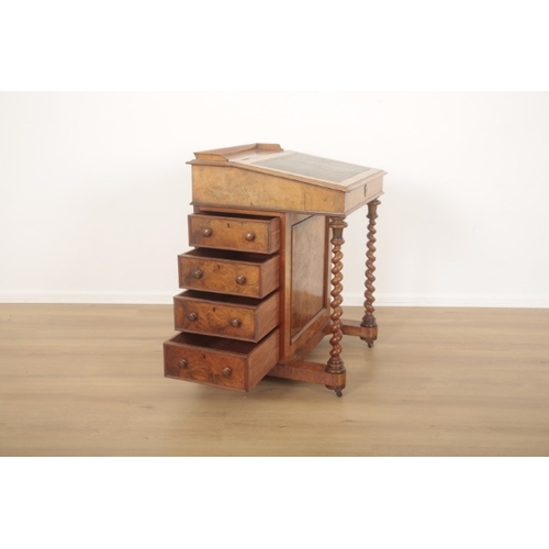 222 - A VICTORIAN WALNUT AND MAHOGANY DAVENPORT

late 19th century, the interior with four satinwood drawe... 