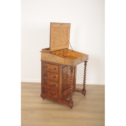 222 - A VICTORIAN WALNUT AND MAHOGANY DAVENPORT

late 19th century, the interior with four satinwood drawe... 