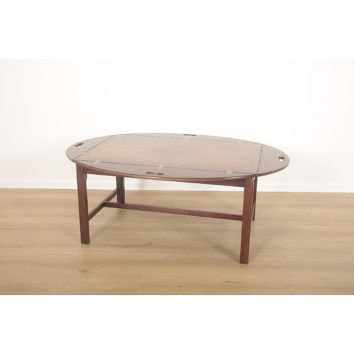 226 - A MAHOGANY BUTLER TRAY AND STAND OF GEORGIAN STYLE

with quartered top, brass hinges to four flaps, ... 