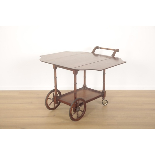 232 - A MAHOGANY TEA TROLLEY BY BEVAN FUNNELL

with two extending leaves and one undertier, 71cm high x 90... 