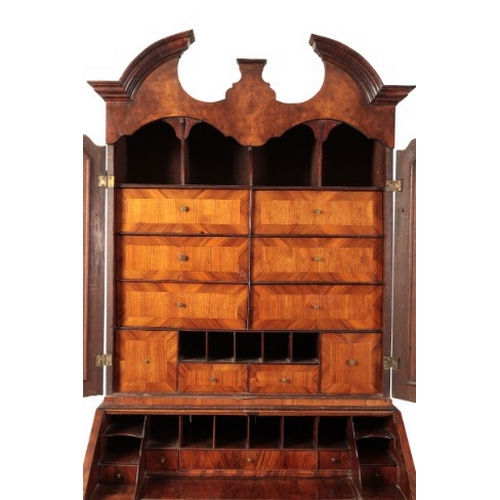 237 - A QUEEN ANNE WALNUT BUREAU BOOKCASE

early 18th century and later, the upper section with a broken s... 