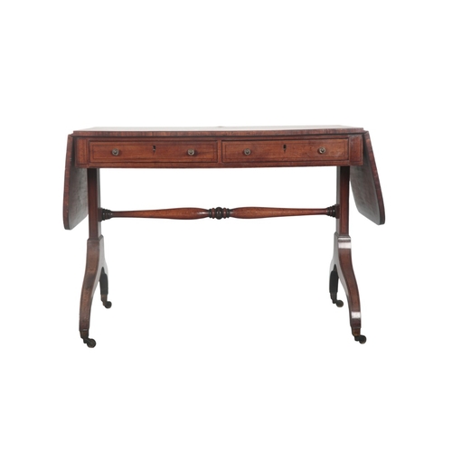 241 - A REGENCY MAHOGANY AND CROSSBANDED SOFA TABLE

with two frieze drawers to one side and two faux draw... 