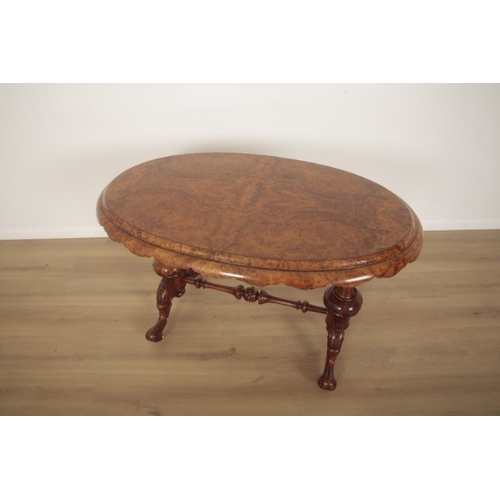 245 - A VICTORIAN BURR WALNUT OCCASIONAL OVAL TABLE

late 19th century, with scalloped edge to the top, tu... 