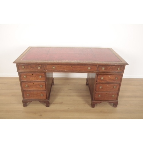 248 - A TWIN PEDESTAL MAHOGANY GEORGIAN STYLE DESK

20th century and later, with tooled leather top above ... 