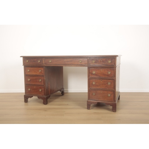 248 - A TWIN PEDESTAL MAHOGANY GEORGIAN STYLE DESK

20th century and later, with tooled leather top above ... 