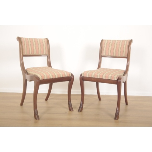 255 - A SET OF FOURTEEN MAHOGANY DINING CHAIRS OF REGENCY STYLE

20th century, the splayed sabre legs with... 