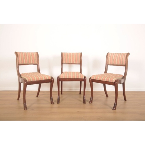 255 - A SET OF FOURTEEN MAHOGANY DINING CHAIRS OF REGENCY STYLE

20th century, the splayed sabre legs with... 