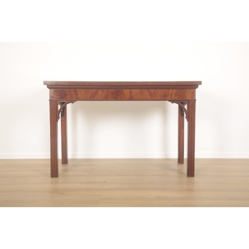 277 - A MAHOGANY HALL TABLE OF GEORGIAN DESIGN

with pierced and scrolled under brackets, terminating on r... 