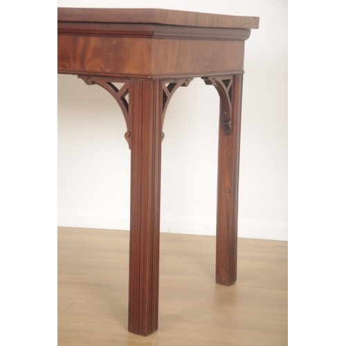 277 - A MAHOGANY HALL TABLE OF GEORGIAN DESIGN

with pierced and scrolled under brackets, terminating on r... 