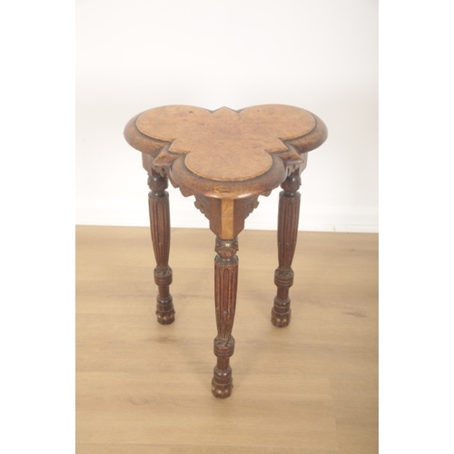 284 - A VICTORIAN REVIVALIST OAK AND WALNUT VENEERED TREFOIL OR CLOVER LEAF WINE TABLE

with shaped frieze... 