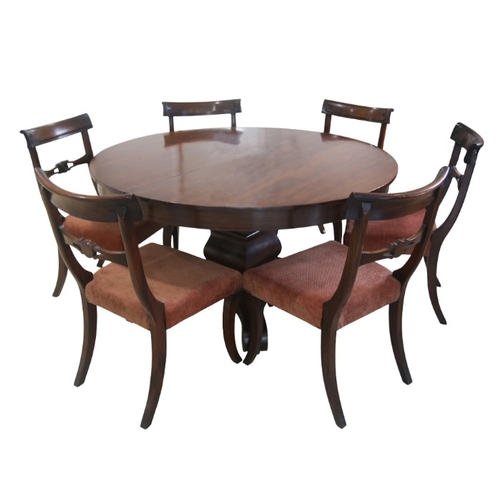 289 - A SET OF SIX REGENCY MAHOGANY DINING CHAIRS

early 19th century, with scrolled backs and central rou... 