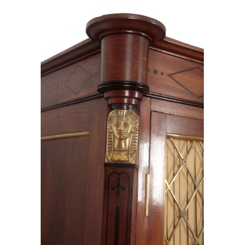 290 - A PAIR OF REGENCY FIGURED MAHOGANY CABINETS OF EGYPTIAN REVIVAL DESIGN

inlaid throughout with eboni... 