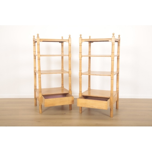 300 - A PAIR OF SYCAMORE FOUR TIER WHATNOTS

with knob terminals, turned legs and each with one lower draw... 