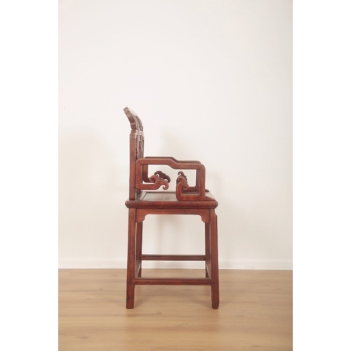 301 - A CHINESE HARDWOOD ARMCHAIR CHAIR

with scrolled back rail and stepped arms, the back splat with a c... 