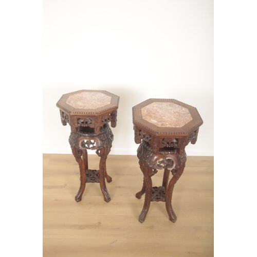 303 - A PAIR OF CHINESE HARDWOOD JARDINIÈRE STANDS

20th century or later, the octagonal top inlaid with m... 