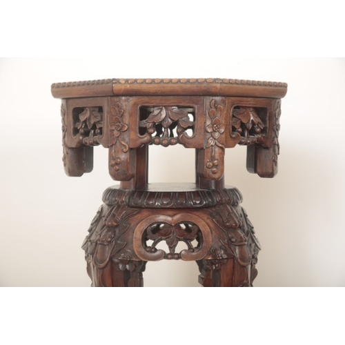 303 - A PAIR OF CHINESE HARDWOOD JARDINIÈRE STANDS

20th century or later, the octagonal top inlaid with m... 