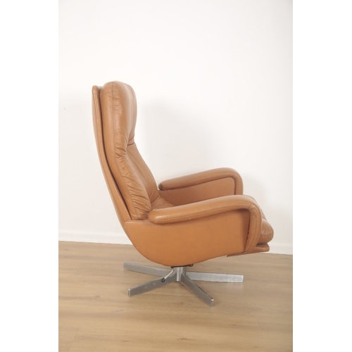 308 - A SWIVEL OFFICE CHAIR MODEL DS231 BY DE SEDE

mid-20th century, Swiss, tan leather with shaped arms ... 