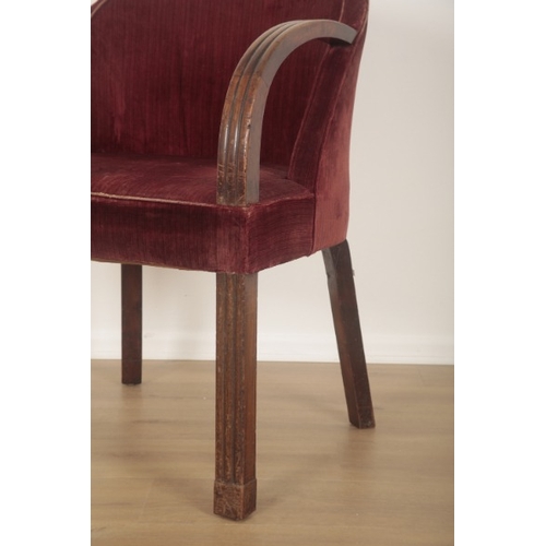 310 - A MAHOGANY ARMCHAIR

stamped to a rear leg 'Howard & Sons Ltd', with red cut velvet covers, on mould... 