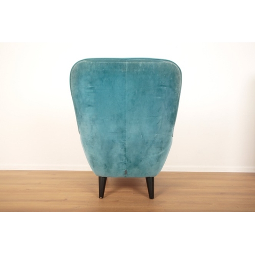 311 - A WINGED ARMCHAIR BY FIBULE DE PARIS

modern, of mid-century modern influence, upholstered in powder... 