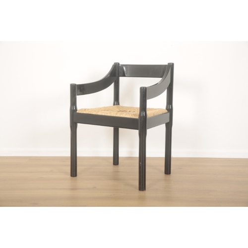 312 - VICO MAGISTRETTI (1920-2006) FOR HABITAT: A PAIR OF BLACK LACQUERED 'CARIMATE' ARMCHAIRS

mid-20th c... 