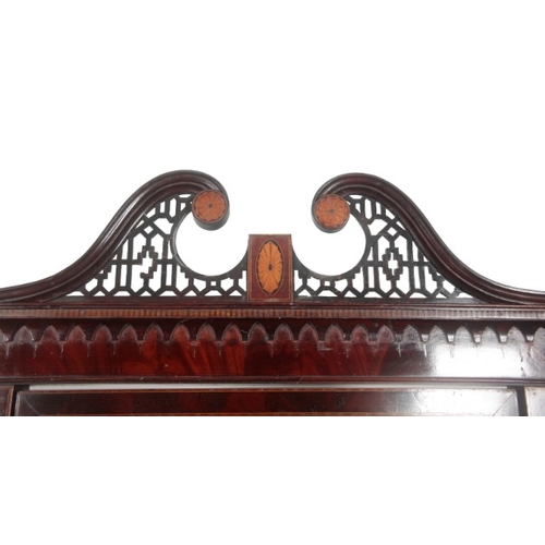 335 - AN EDWARDIAN MAHOGANY AND SATINWOOD STRUNG CHEVAL MIRROR

the bevelled rectangular plate with a tilt... 