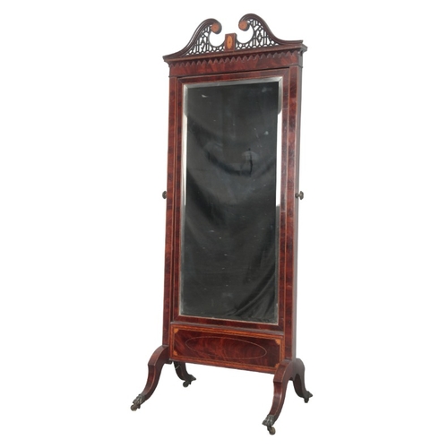 335 - AN EDWARDIAN MAHOGANY AND SATINWOOD STRUNG CHEVAL MIRROR

the bevelled rectangular plate with a tilt... 