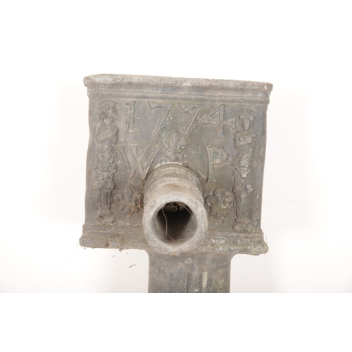 362 - A GEORGE III LEAD WATER SPOUT

dated 1774 and initialled WP, 96cm high overall