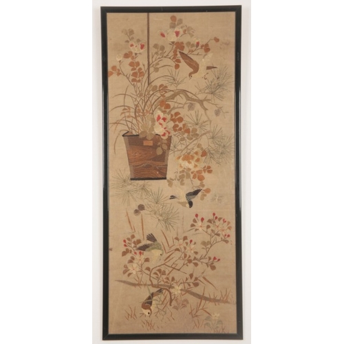 93 - A CHINESE SILK EMBROIDERED PANEL

20th century, worked in coloured threads with birds amongst foliag... 