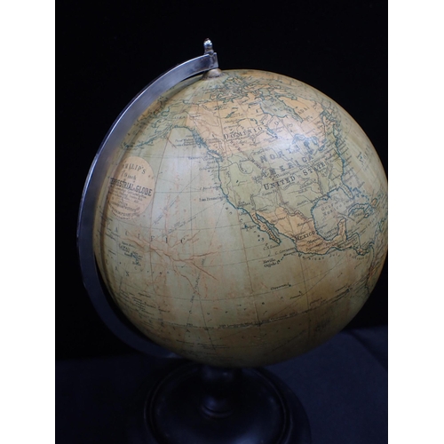 129 - A 1920s/30s PHILIPS  9-inch TERRESTRIAL GLOBE on ebonised stand with chromed meridian