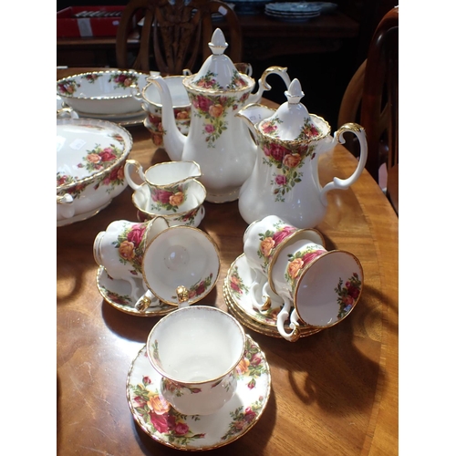 141 - A QUANTITY OF ROYAL ALBERT 'OLD COUNTRY ROSES' DINNER WARE including covered serving dishes, coffee ... 