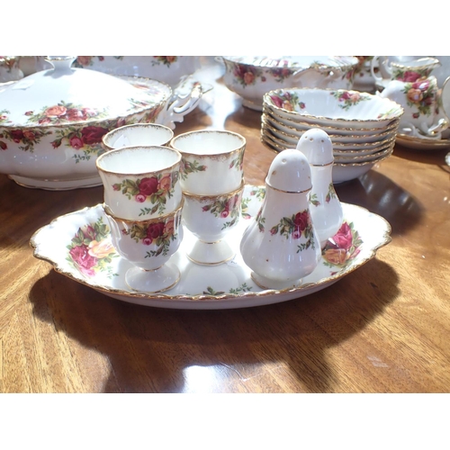 141 - A QUANTITY OF ROYAL ALBERT 'OLD COUNTRY ROSES' DINNER WARE including covered serving dishes, coffee ... 