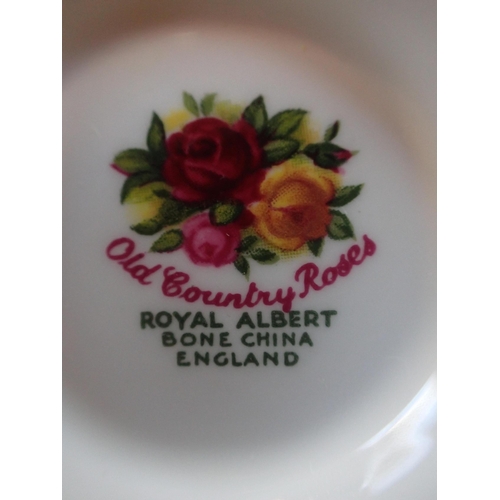 149 - A QUANTITY OF ROYAL ALBERT 'OLD COUNTRY ROSES' TEA WARE including cake stands, teapots, a wall clock... 