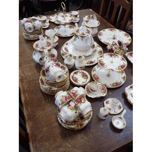 149 - A QUANTITY OF ROYAL ALBERT 'OLD COUNTRY ROSES' TEA WARE including cake stands, teapots, a wall clock... 