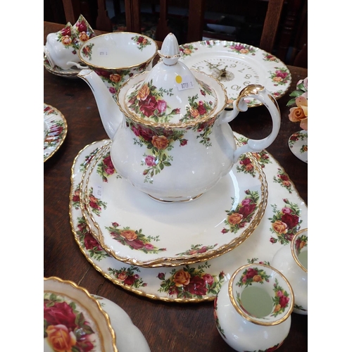 149 - A QUANTITY OF ROYAL ALBERT 'OLD COUNTRY ROSES' TEA WARE including cake stands, teapots, a wall clock... 