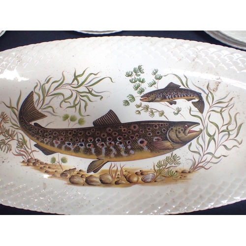 161 - A FRENCH FISH SERVICE with large oval platter, decorated with fish (one plate damaged)