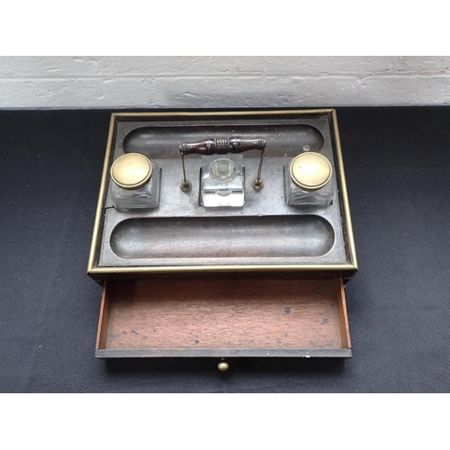 163 - A ROSEWOOD AND BRASS DESK STAND WITH INKWELLS 19th century