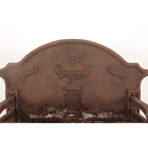 23 - A CAST IRON FIRE BASKET decorated with classical motifs, the bow fronted body on fluted column legs,... 