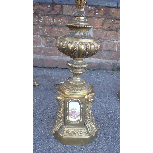 232 - A BRASS TRIPOD STANDARD LAMP of 19th century style, another metal standard lamp and a gilt metal tab... 