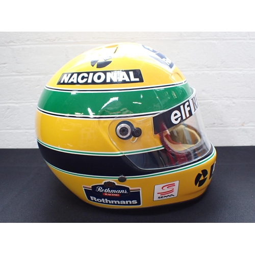 235 - AYRTON SENNA: A REPRODUCTION RENAULT RACING HELMET in Brazilian colours, with Rothmans and Nacional ... 