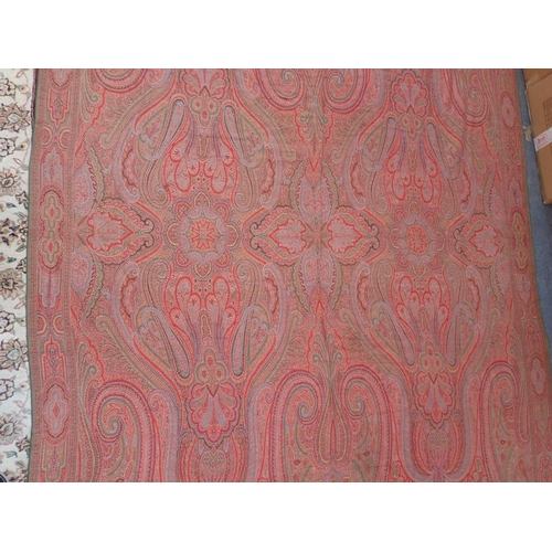 284 - AN ANTIQUE WOOLLEN PAISLEY 'CRINOLINE' SHAWL with fringe, approx 330 x 167cm (some marks, but appear... 