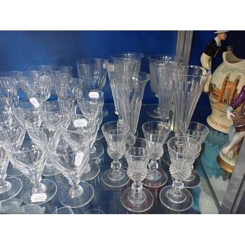 298 - FIVE CUT GLASS THISTLE LIQUEUR GLASSES four Champagne flutes, and various stemmed glasses