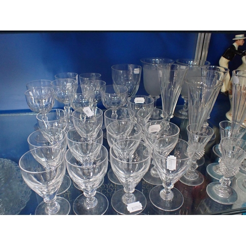 298 - FIVE CUT GLASS THISTLE LIQUEUR GLASSES four Champagne flutes, and various stemmed glasses