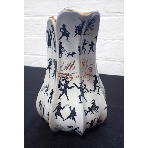 303 - A STAFFORDSHIRE JUG PRINTED WITH SILHOUETTES dated 1855