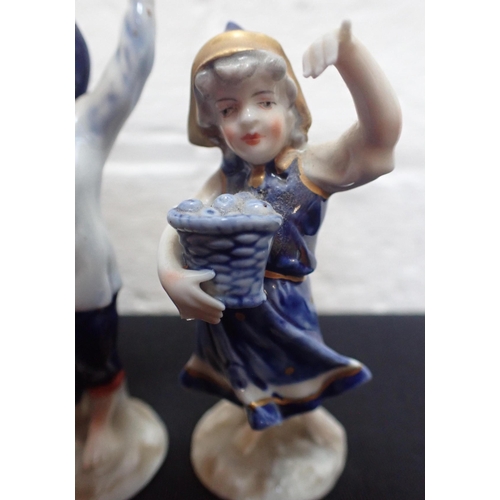 310 - THREE 19TH CENTURY GERMAN PORCELAIN FIGURES OF CHILDREN 8cm high (one repaired)